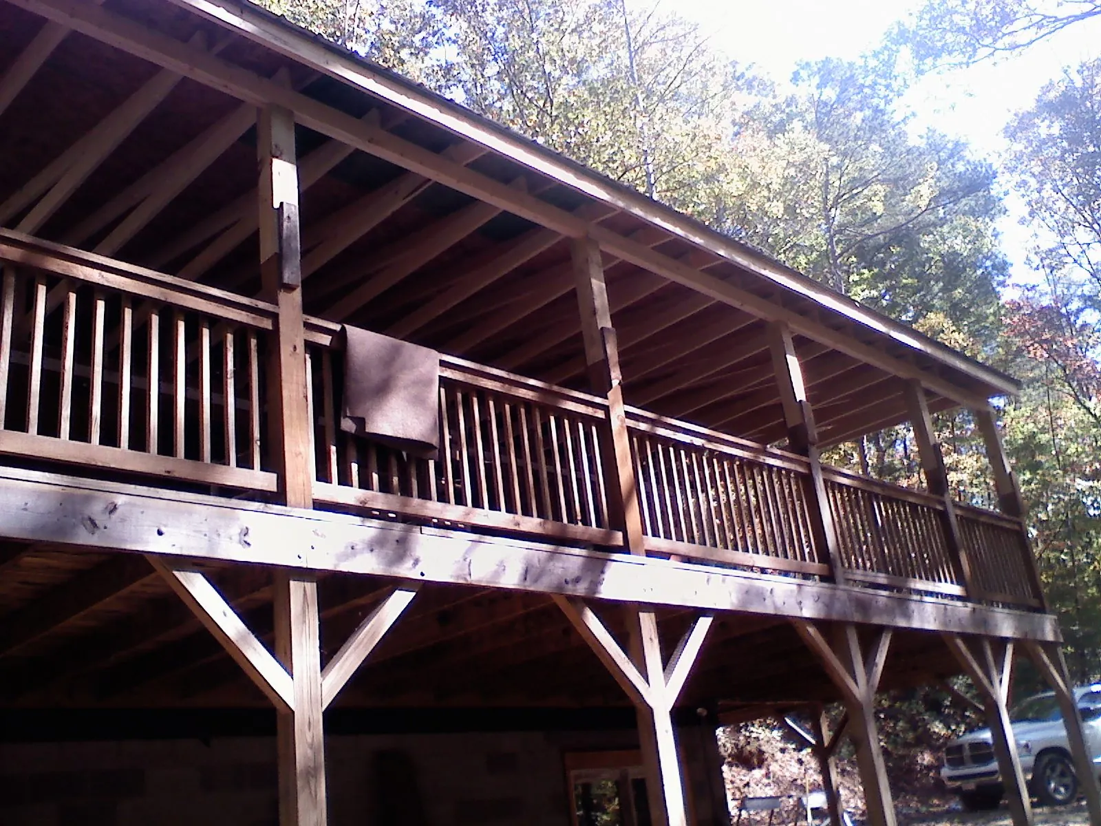 Timber framing under a new elevated porch and deck — Roof Leak Repair in Randall by Roofing Brothers